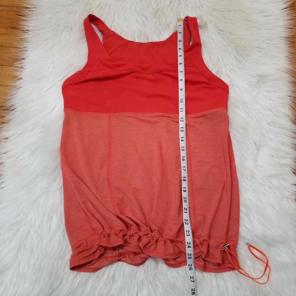 LULULEMON Tank Top Orange Red Color, Adjustable at the bottom SIZE M/L...
